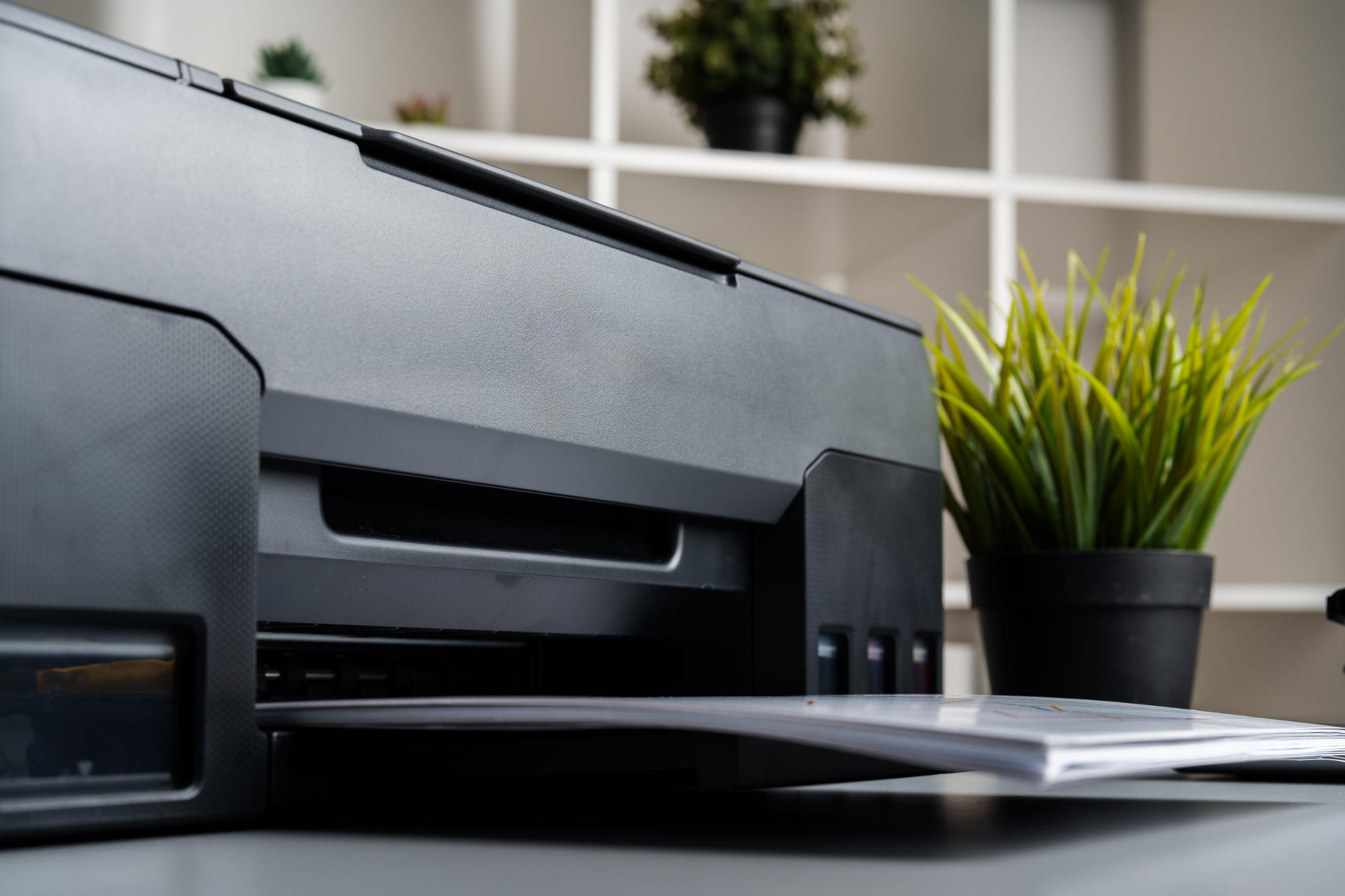 Close-up of modern printer in the office