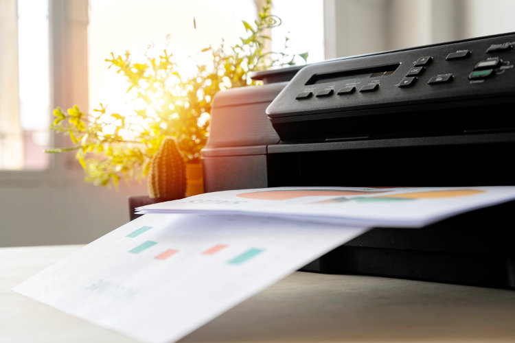 Printer fully functional located on desk important in office to present work